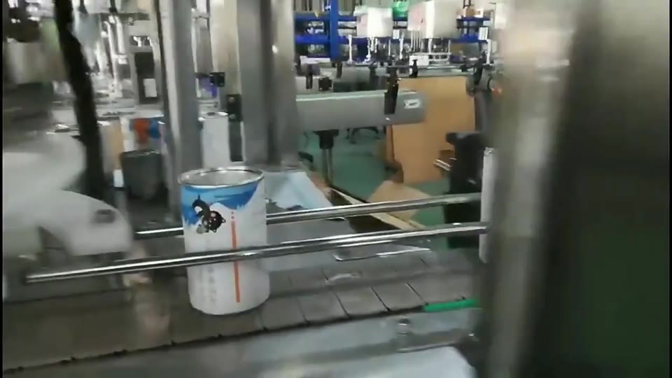 Can lid feeding and seaming — V010