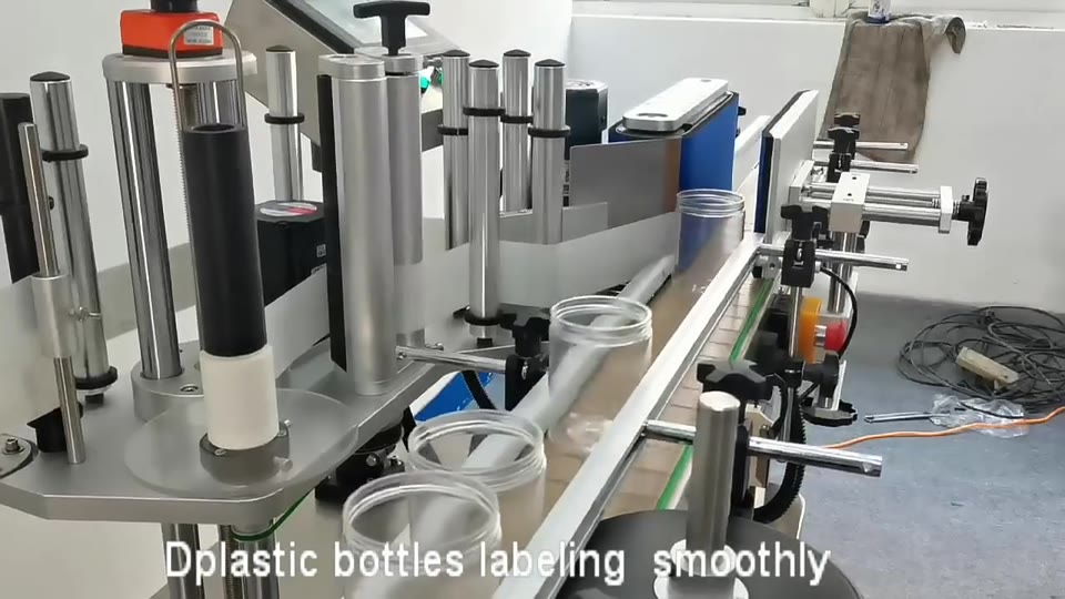 Upright bottle label application — V020