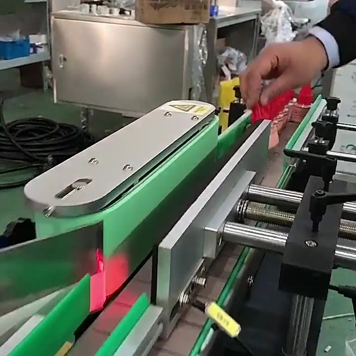 Upright bottle label application — V031
