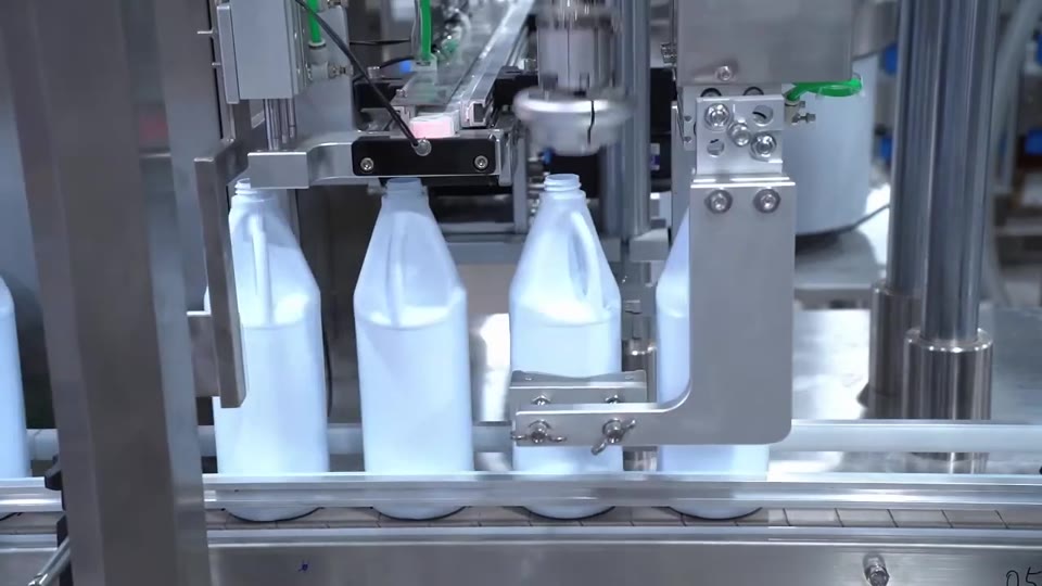 Rotary bottle capping — V033