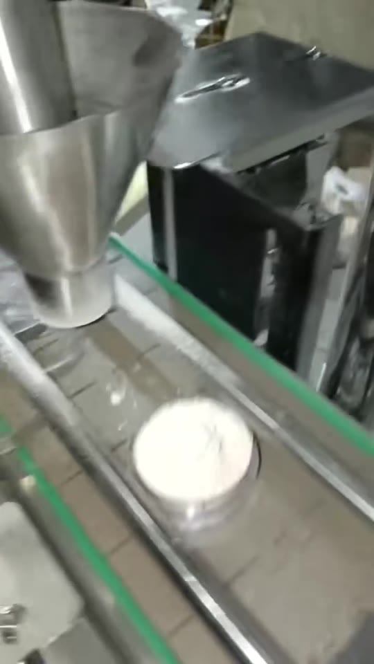Powder dispensing into small pots — V038