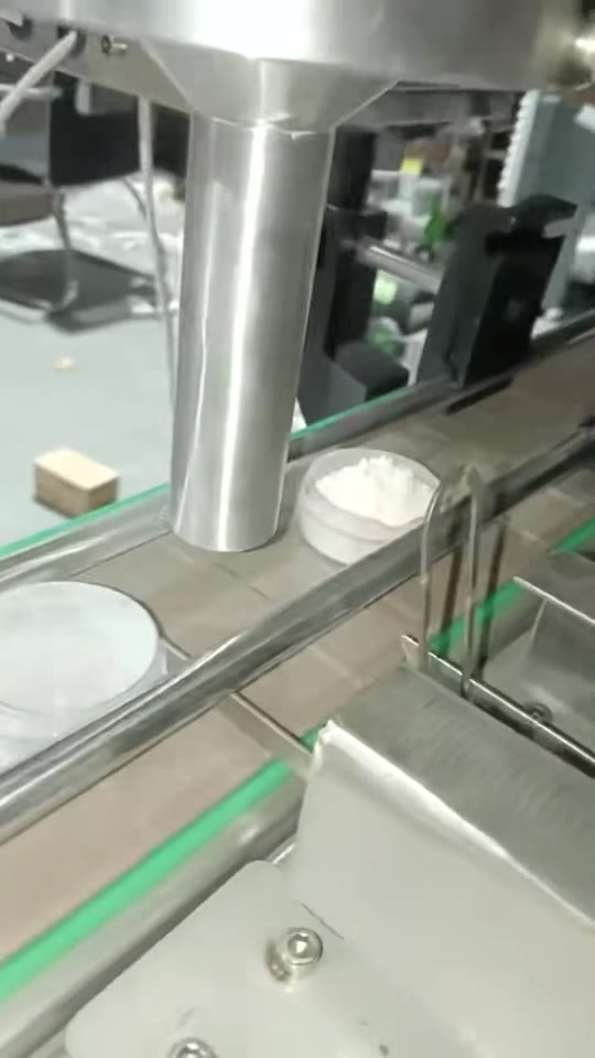 Powder dispensing into small pots — V063